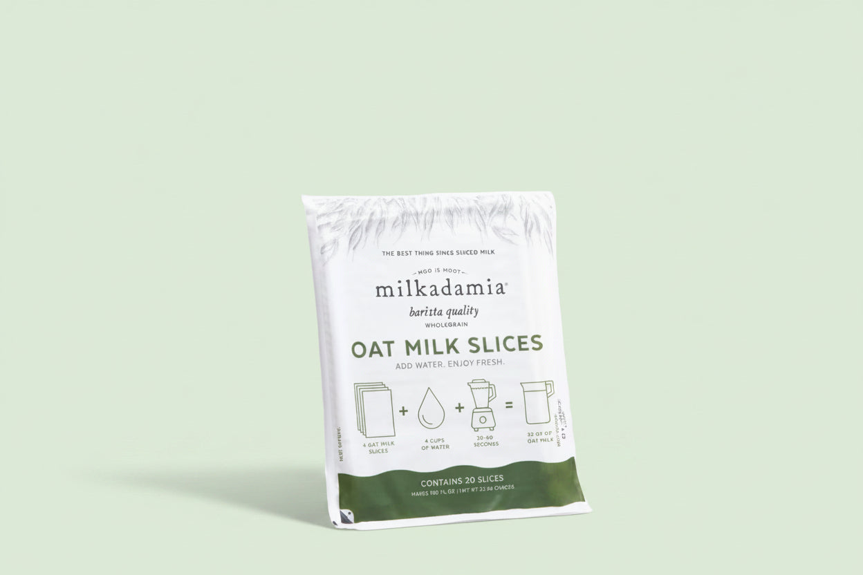 milkadamia Oat Milk Sliced 160oz packaging stood up against a white background